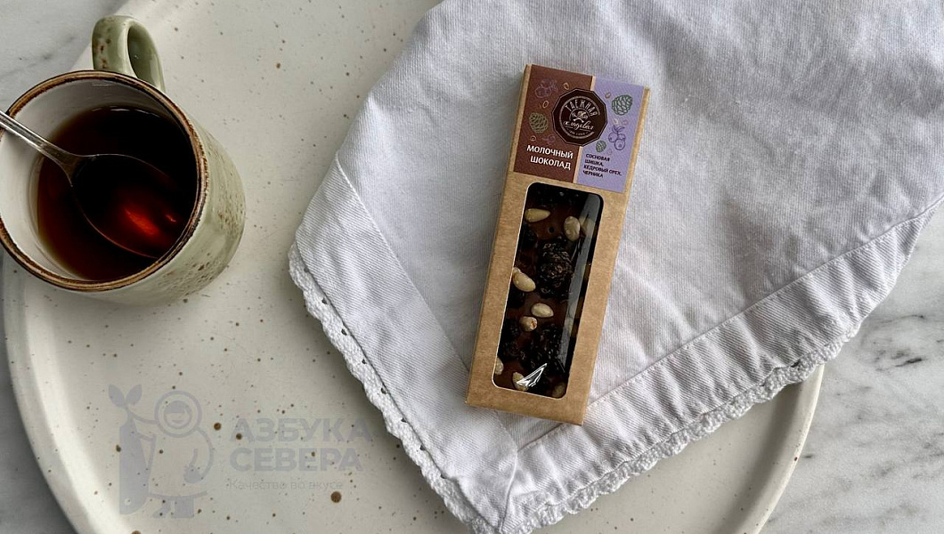  Шоколад молочный с сосновой шишкой, черникой и кедровый орех